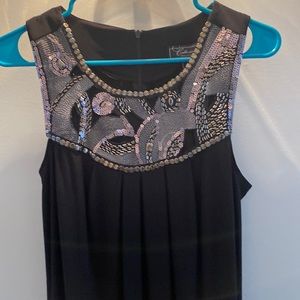 Black sequin neck dress by Collection Dress Barn.